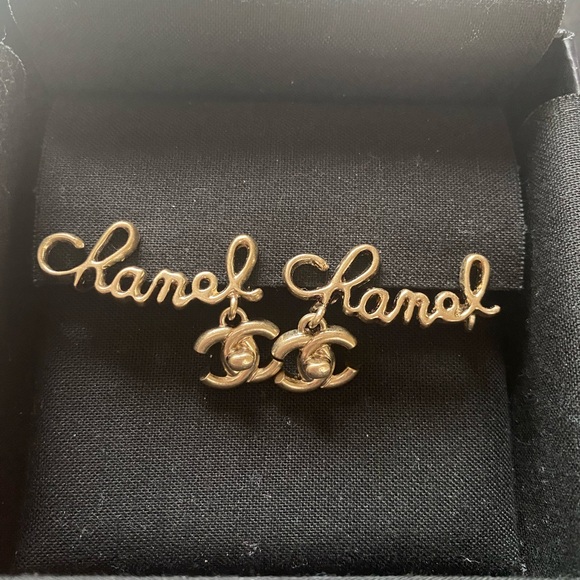 CHANEL Jewelry - NEW Chanel CC Script Turnlock Clip-On Climber Dangling Earrings Matte Gold